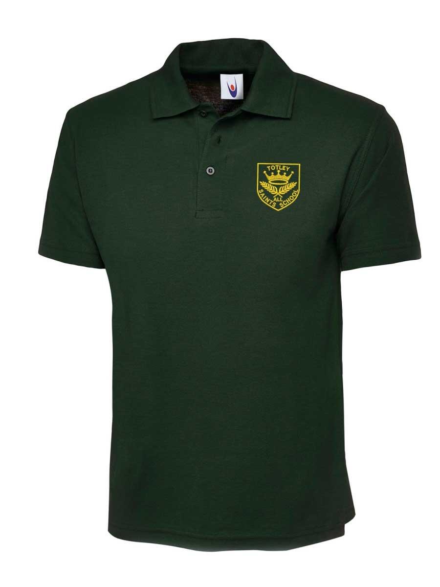Dark green polo shirt featuring a yellow embroidered emblem on the left chest area. The emblem has text and a graphic. The shirt has short sleeves and a buttoned collar.